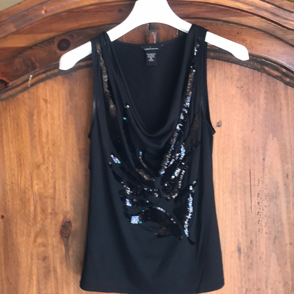 Black sleeveless top with sequin pattern